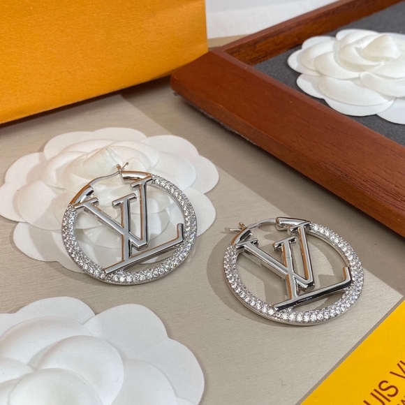 Louis Vuitton earrings - Picture 1 of 3
